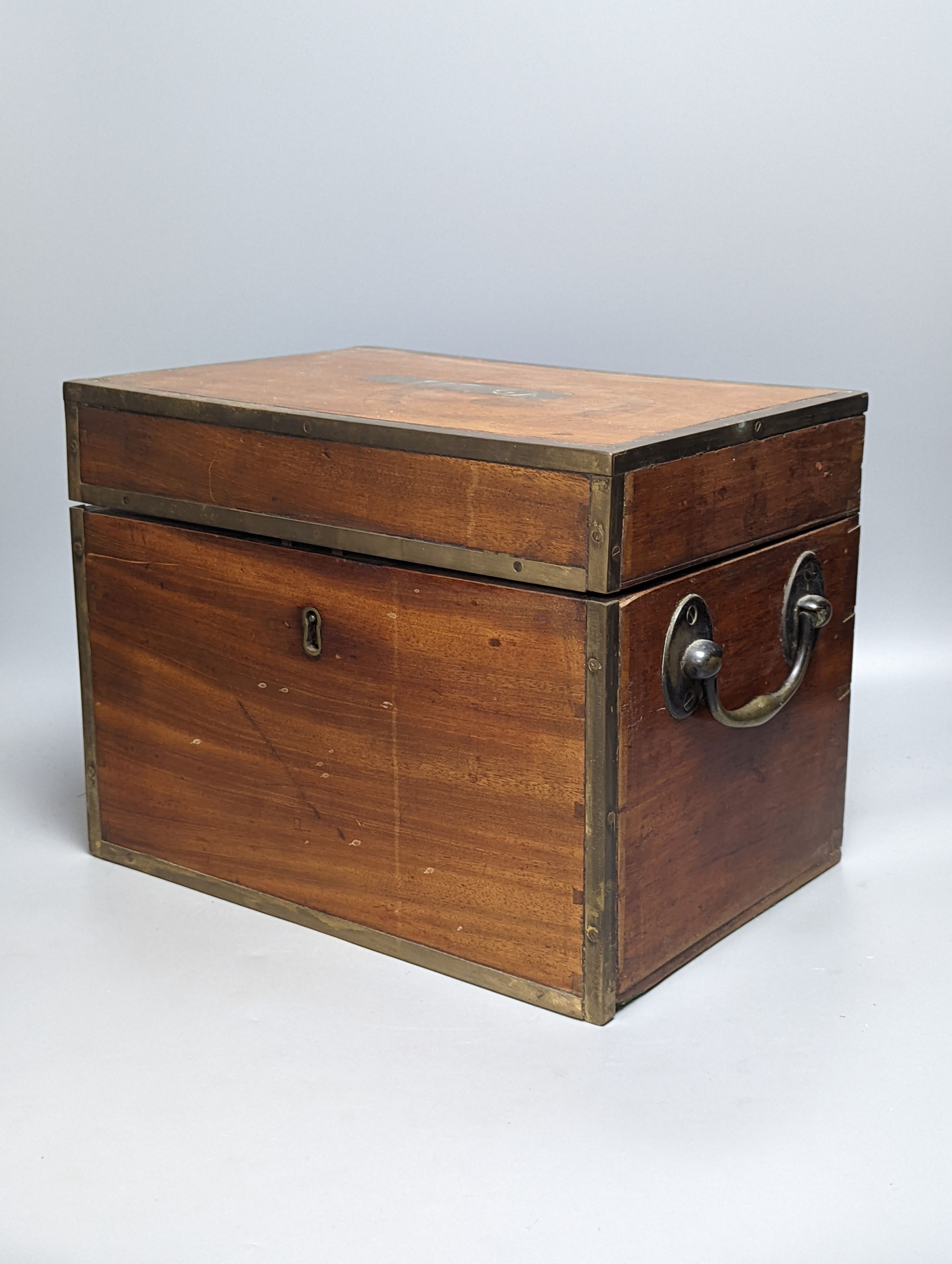 A brass bound mahogany six bottle decanter box, containing 6 cut glass decanters